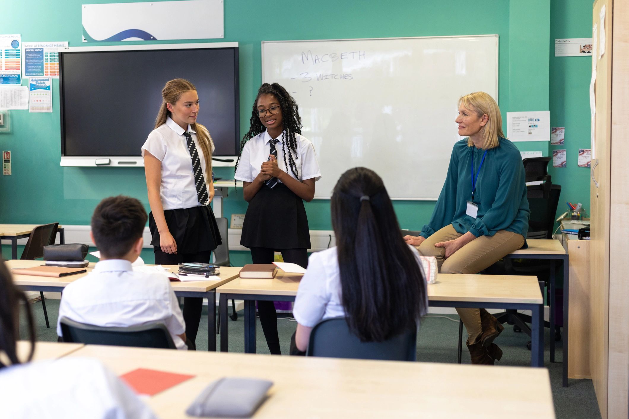 Students participating in a workshop with a teacher